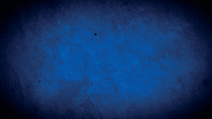 Naklejka premium Dark blue textured background with subtle grainy and vignette effects.