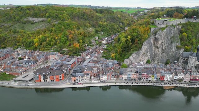 Aerial view of Dinant city with the Collegiate Church of Notre-Dame, the Citadel on the cliff and Meuse river, under soft light, Belgium. #5