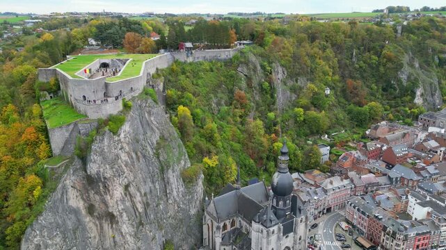 Aerial view of Dinant city with the Collegiate Church of Notre-Dame, the Citadel on the cliff and Meuse river, under soft light, Belgium. #2