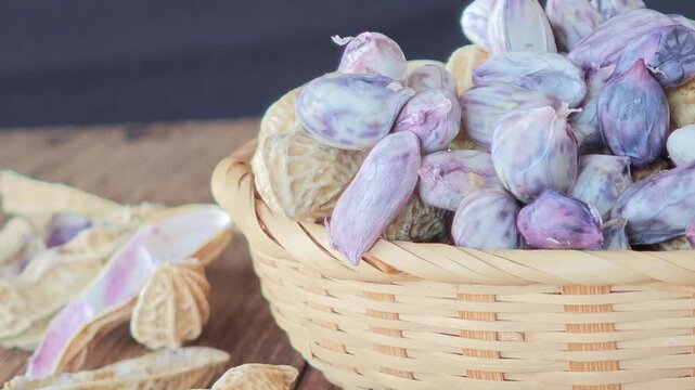 Boiled peanuts in a container.