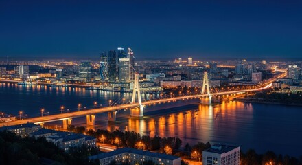 Obraz premium Cityscape at dusk illuminated bridge spans water, city lights twinkle