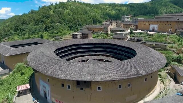 Aerial view of a traditional circular tulou building in China