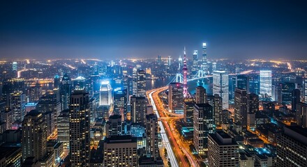 Fototapeta premium Nighttime cityscape with illuminated skyscrapers and vibrant city lights.