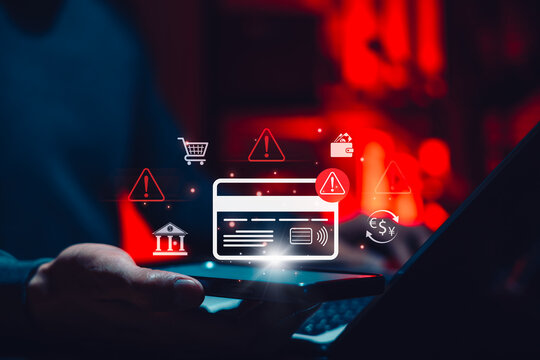 Payment Fraud Alert and Card Security Risk Concept. Person holding smartphone with credit card, warning icons, banking, shopping, wallet, currency symbol, suspicious transaction, online payment threat