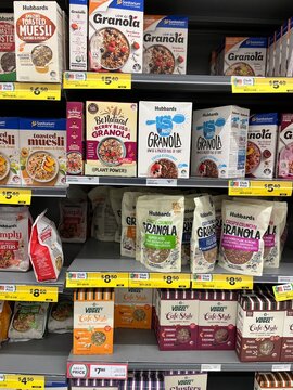 Supermarket shelf display featuring assorted breakfast muesli and granola brands including Hubbards and Vogel's at Hollywood Bakery - Auckland, New Zealand, February 7, 2023
