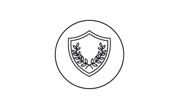 A simple black and white logo featuring a shield with leaves on a circular background