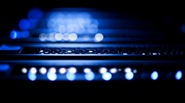 Close-up view of illuminated server components in a data center with cool blue lighting. product launch decks, UI/UX mockups, designed for data visualization dashboards and holographic UIs.