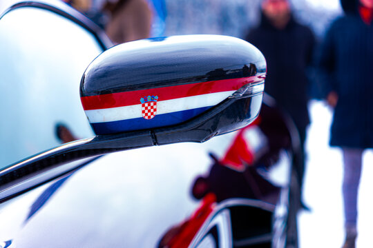 Croatian flag at the back of a car mirror