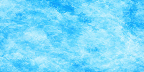 Obraz premium An abstract blue water surface texture ripples under a bright summer sky with fluffy white clouds and light reflections for a natural day background
