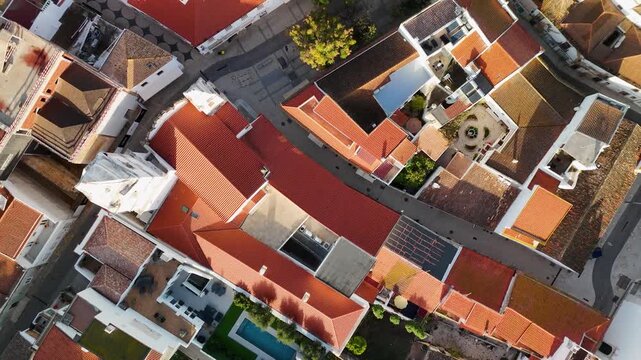 Vertical Aerial Drone Shot of White Rooftops and City Streets in Lagos Algarve Portugal