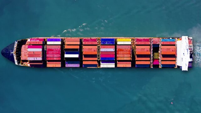Container ship navigating busy trade routes with loaded shipping containers in a dynamic maritime landscape