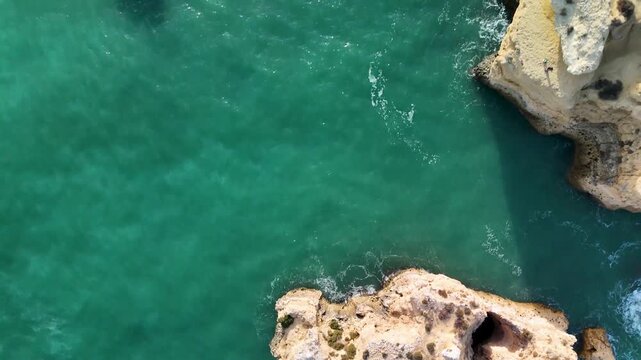 Birds Eye View Drone Shot of Rocks and Cliffs at Praia dos Paradinha Algarve Coastline Portugal