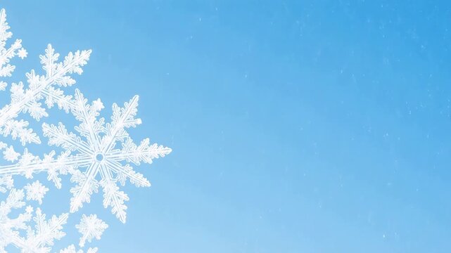 Snowflake against blue sky