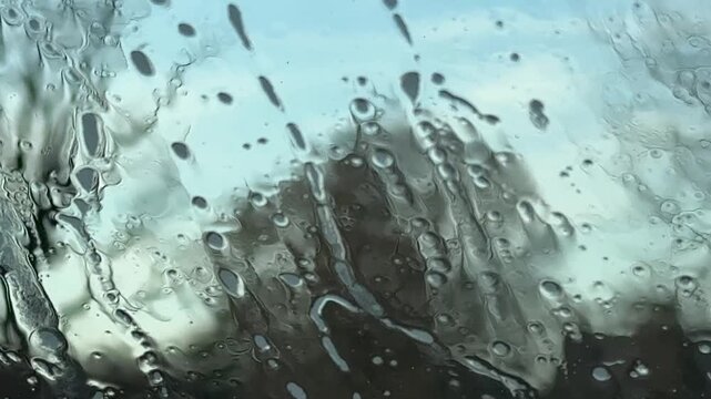 Car Interior View of Window Washed with Soap and Water