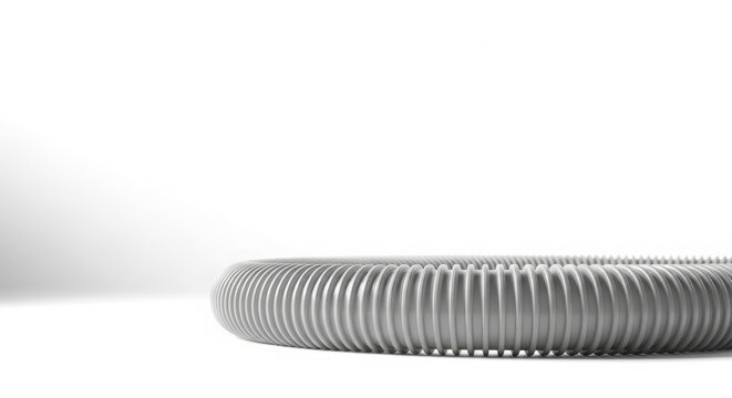 Textured close-up studio shot of a flexible gray ribbed hose or tube on a clean white background.