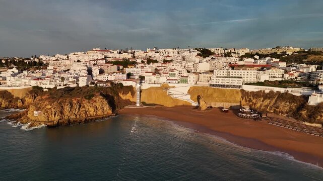 Aerial Drone Approach to Albufeira Beach Elevator and Historic Old Town Coastline Algarve Portugal