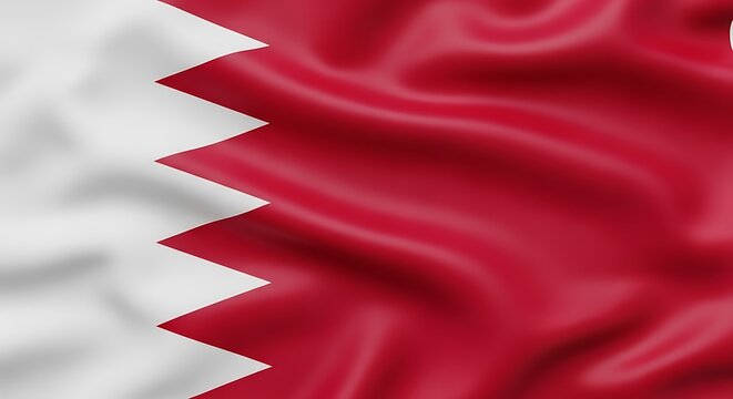 The flag of qatar waving in the wind