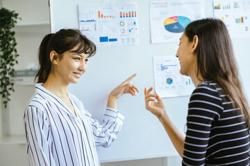Obraz premium Business team meeting discussion collaboration presenting data analysis corporate teamwork diverse professionals planning strategy office communication partnership