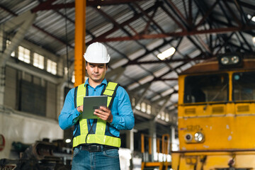 professional technician engineer with safety helmet hard hat working in industrial manufacturing factory, men at work to checking equipment of machinery production technology or construction operating