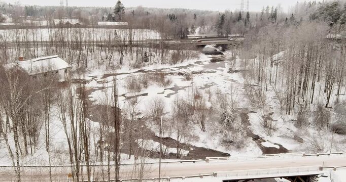 Aerial view of Vantaankoski rapids in cloudy winter weather, Vantaa, Finland, Europe.