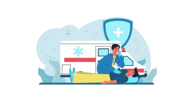 Paramedic treating injured patient beside ambulance in medical emergency