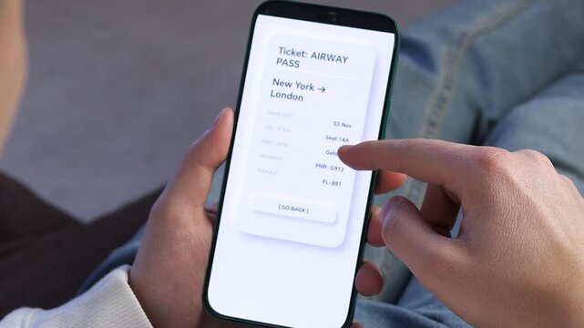 POV shot of a business traveler holding a phone with an e-ticket. Clean interface with flight details, gate, and seat info. Ideal for corporate travel stories, vacation planning ads, and digital nomad