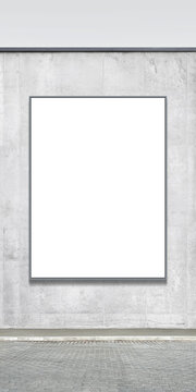 A large vertical white advertising billboard is placed on the facade of a concrete fence, designed for creative use. Presentation space. Advertising space.