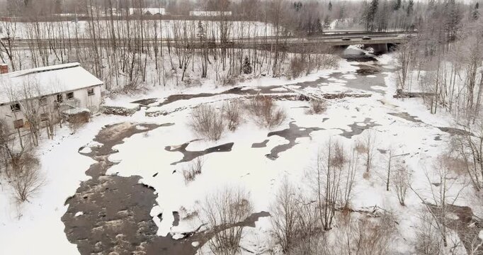 Aerial view of Vantaankoski rapids in cloudy winter weather, Vantaa, Finland, Europe.