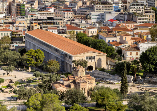 Athens, Greece, Stoa of Attalos and Byzantine church in the Ancient Agora, elevated view. Dense cityscape