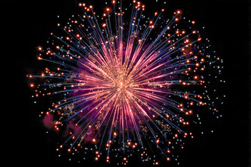 Obraz premium Vibrant explosion of colorful fireworks lighting up the night sky with dazzling pink, orange, and blue sparks spreading in all directions in a festive celebration sc