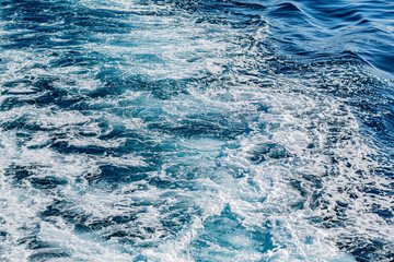 Fototapeta premium Foamy blue ocean wake texture