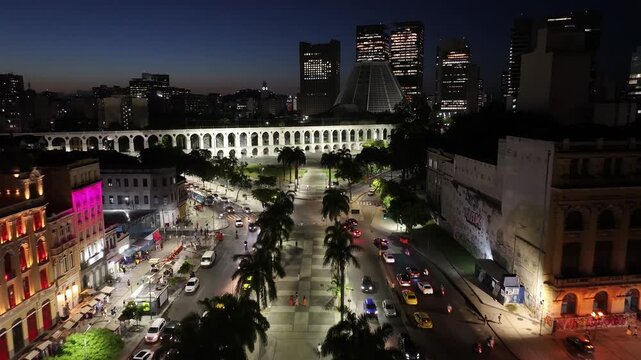 Sunset Skyline In Arches Of Lapa In Rio De Janeiro In Brazil. Sunset Landscape. Downtown District. Landmark Monument. Sunset Skyline In Arches Of Lapa In Rio De Janeiro In Brazil. 