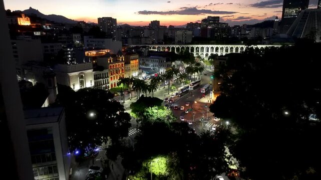 Sunset Skyline In Arches Of Lapa In Rio De Janeiro In Brazil. Sunset Landscape. Downtown District. Landmark Monument. Sunset Skyline In Arches Of Lapa In Rio De Janeiro In Brazil. 