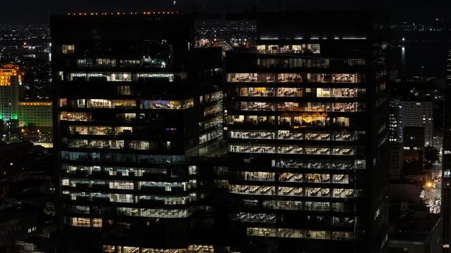 Corporate Buildings In Rio De Janeiro Brazil. Illuminated Ferris Wheel Landscape. Downtown District. Highrise Buildings. Corporate Buildings In Rio De Janeiro Brazil. Night Life Tourism. 