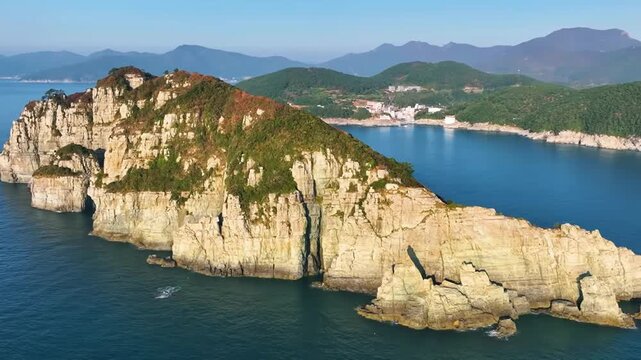 White Coastal Cliffs Above Blue Ocean