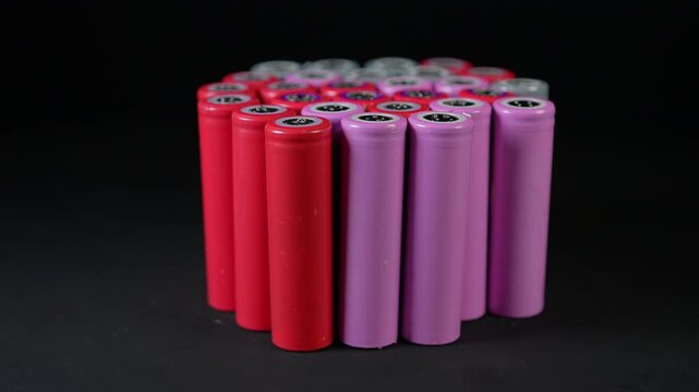 Sorting used batteries for recycling and reuse. Environmental protection and conservation. Safety and sustainability of electronic waste recycling process. AA silver batteries prepared for disposing