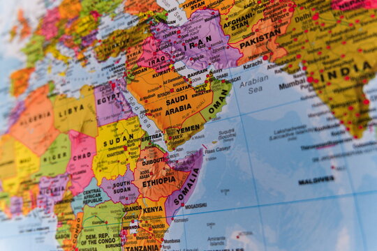 A vivid, highly detailed colorful political map with selective focus showing the Middle East, Arabian Peninsula, and East Africa. 