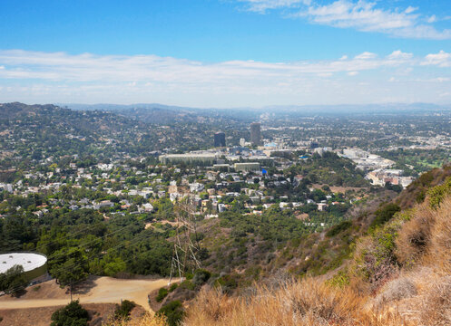 Skyline of Universal City as seen from the top of Cahuenga Peak at Wisdom Tree during a summer season in Los Angeles, California, USA
