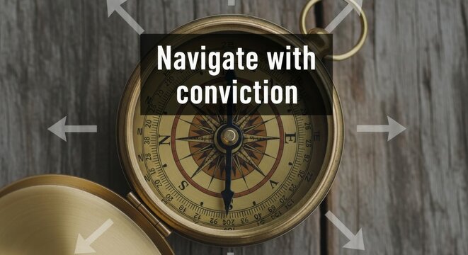 Antique brass compass pointing direction on wooden surface