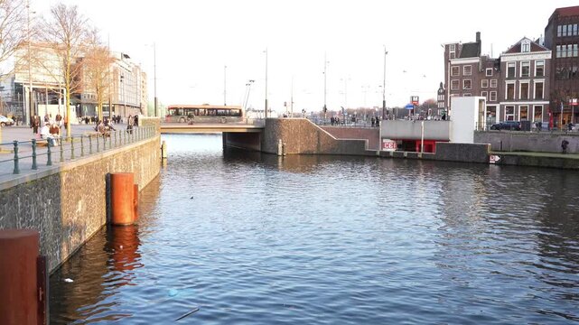 A view of the busy traffic above and below the Kamper bridge in the city centre of Amsterdam.