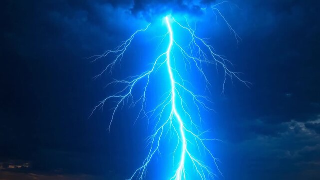 Bright blue lightning bolt in night sky