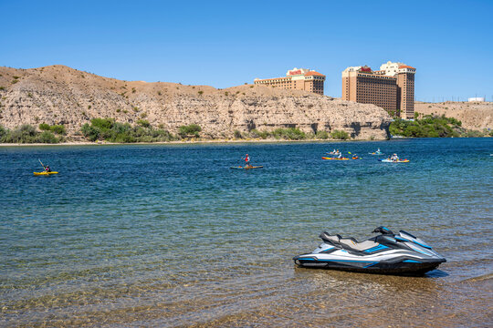 People kayaking and having fun on the river.