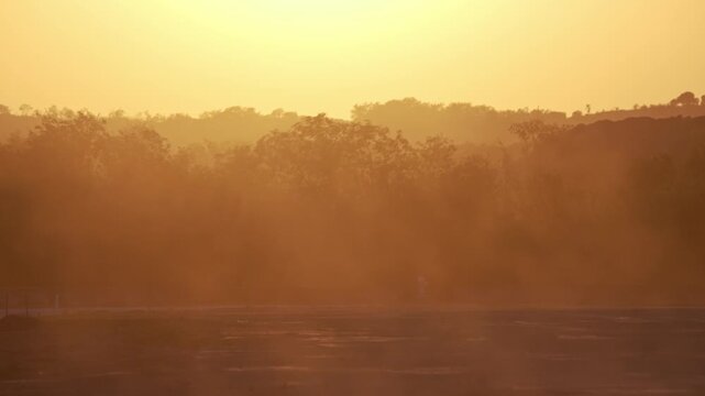Windblown Dust and Haze Over Drought Stricken Texas Hill Country at Sunset. Telephoto.