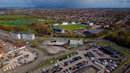 High aerial view of cricket stadium and large parking lots © Андрей Нелупов
