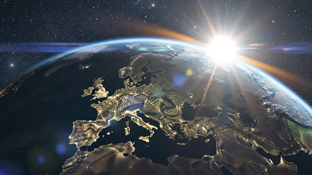 Planet Earth with city lights over Europe at dawn from space