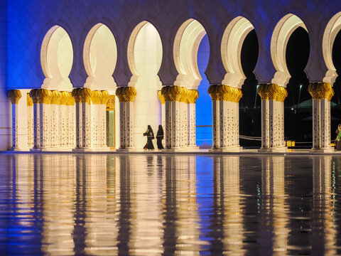 Sheikh Zayed Grand Mosque colonnade reflection copy space