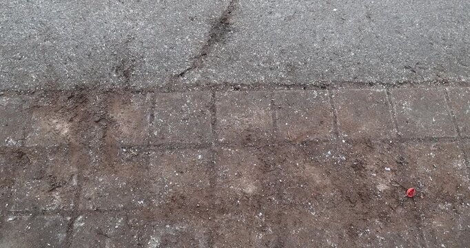 Top Down View Of Dirty Brick And Concrete Path