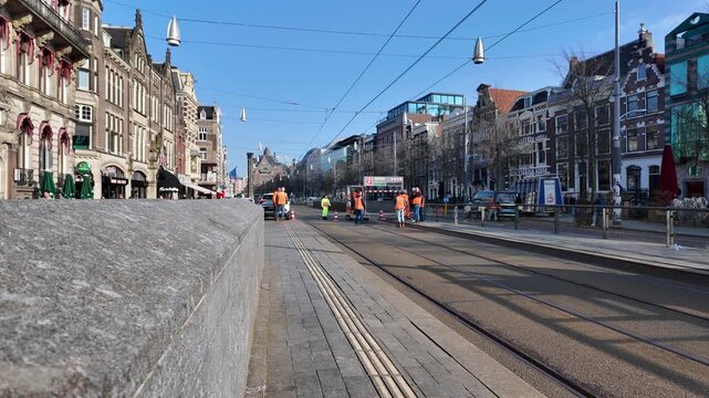 Maintenance work in progress at a tram stop in the city of Amsterdam.
