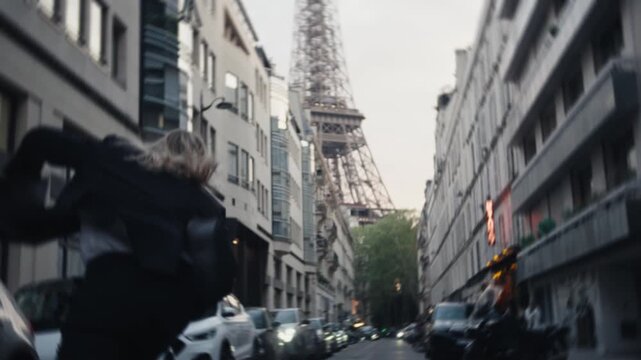 Stylish businesswoman skateboarding through a parisian street