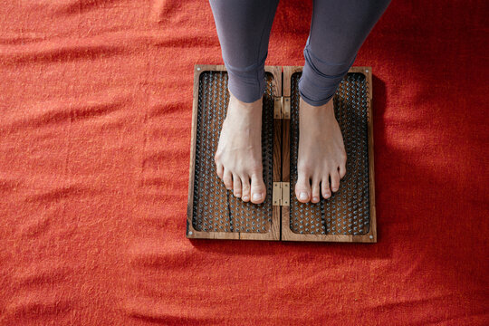 Sadhu board with sharp metal nails. Yoga and health concept